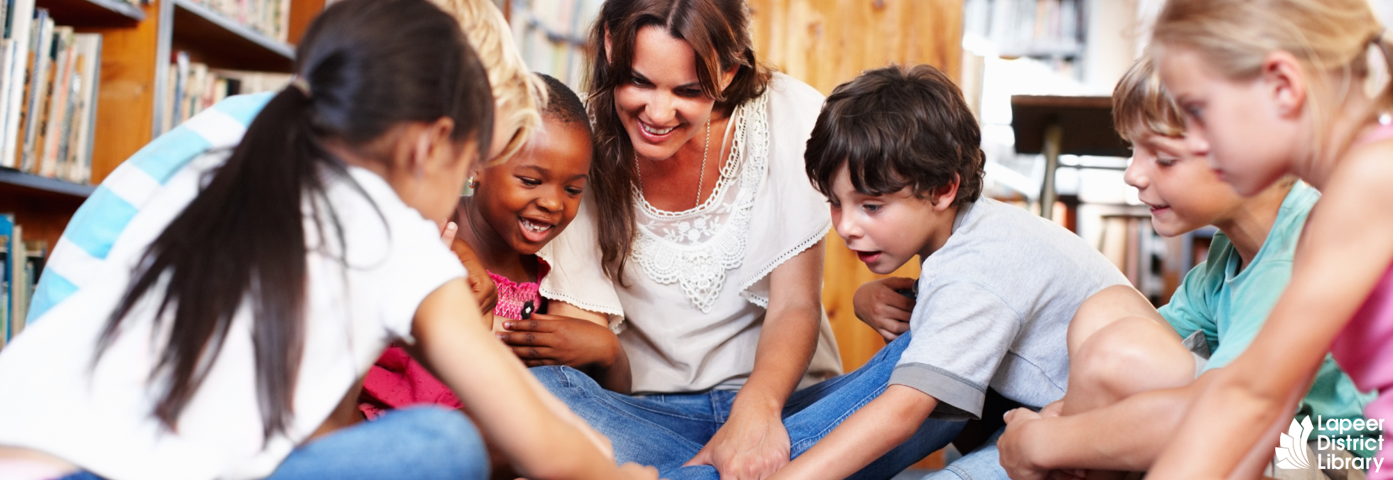 Kids and adult in the library